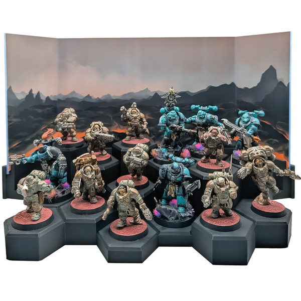 Painted miniatures on 40mm bases across a tiered hex display stand, framed by a lava landscape acrylic backdrop