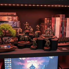 WarSplay Hero display stand connecting into a larger modular painted-army display